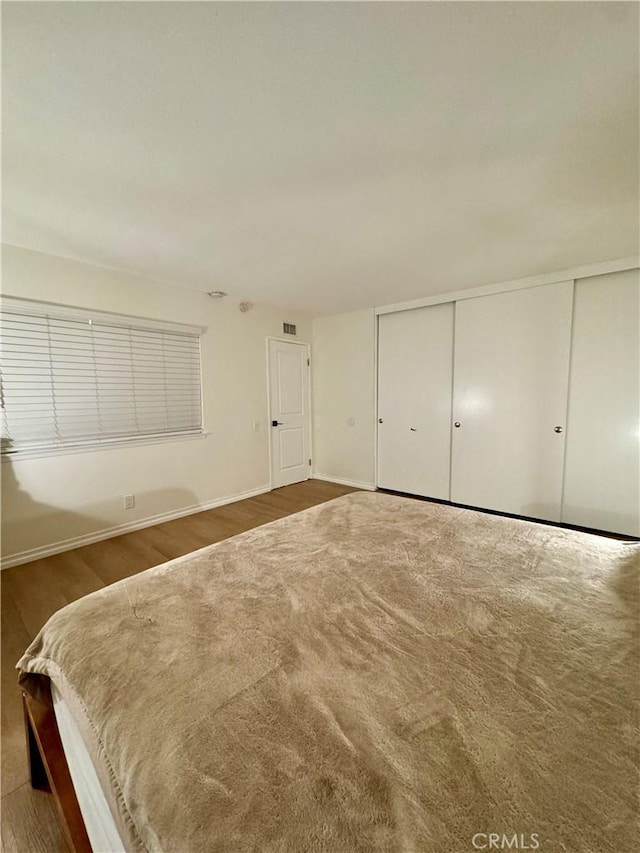 16040 Leffingwell Rd Unit 78, Whittier, CA 90603 - bedroom with wood finished floors and a closet
