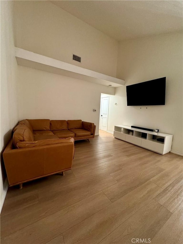 16040 Leffingwell Rd Unit 78, Whittier, CA 90603 - living area featuring wood finished floors and vaulted ceiling
