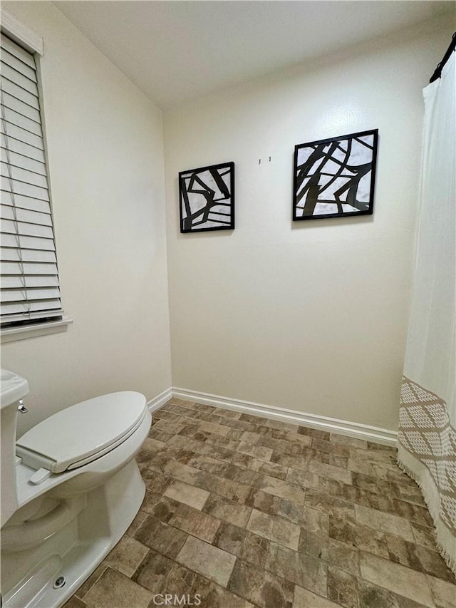 16040 Leffingwell Rd Unit 78, Whittier, CA 90603 - bathroom featuring toilet and a shower with shower curtain