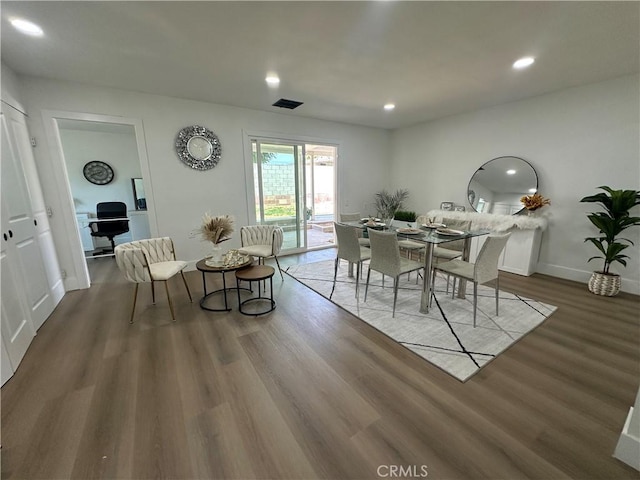 1598 W 7th St, San Bernardino, CA 92411 - dining space with wood finished floors and recessed lighting