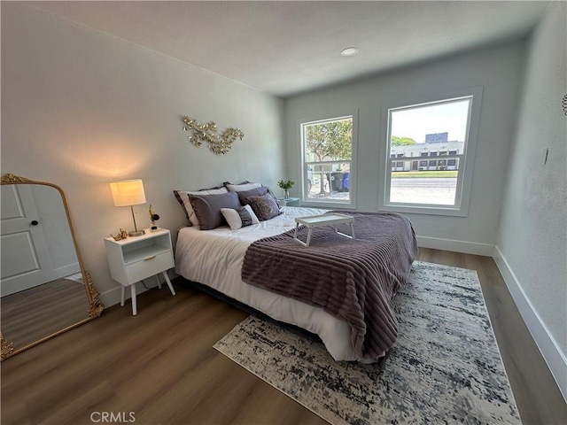 1598 W 7th St, San Bernardino, CA 92411 - bedroom featuring dark wood-style flooring and baseboards