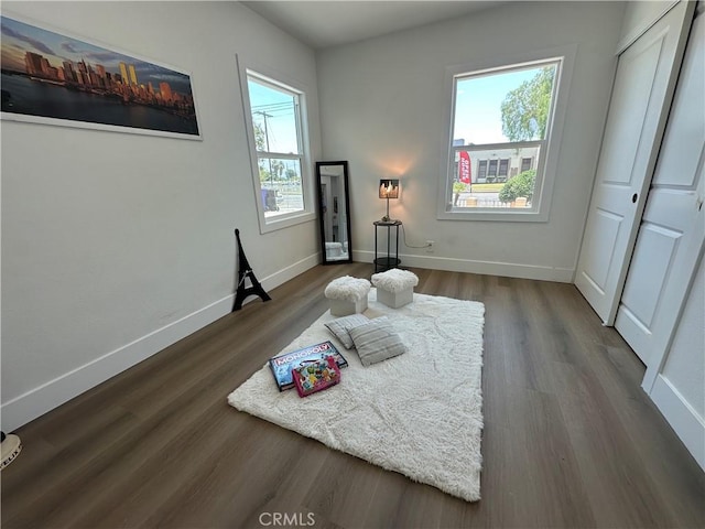 1598 W 7th St, San Bernardino, CA 92411 - living area featuring dark wood finished floors and baseboards
