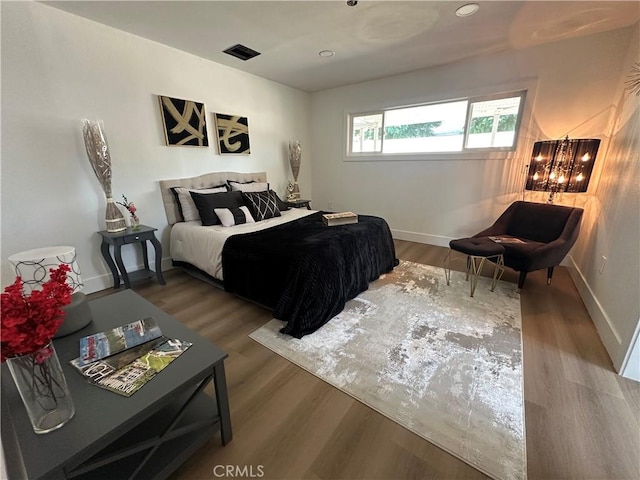 1598 W 7th St, San Bernardino, CA 92411 - bedroom with wood finished floors and baseboards