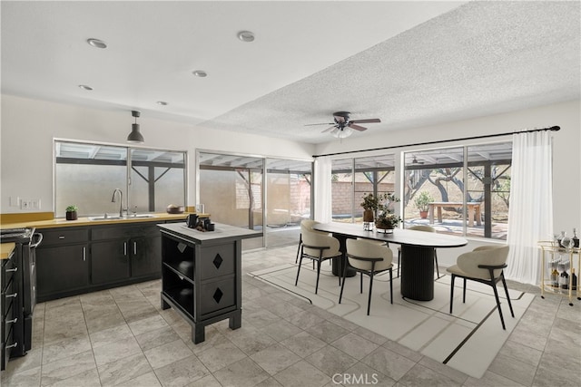1824 Greenleaf Dr, West Covina, CA 91792 - dining area featuring a ceiling fan, a textured ceiling, and recessed lighting
