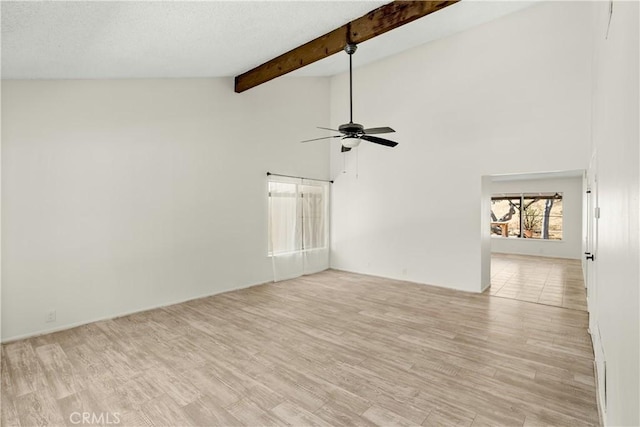 1824 Greenleaf Dr, West Covina, CA 91792 - empty room with a ceiling fan, light wood-type flooring, beamed ceiling, and high vaulted ceiling