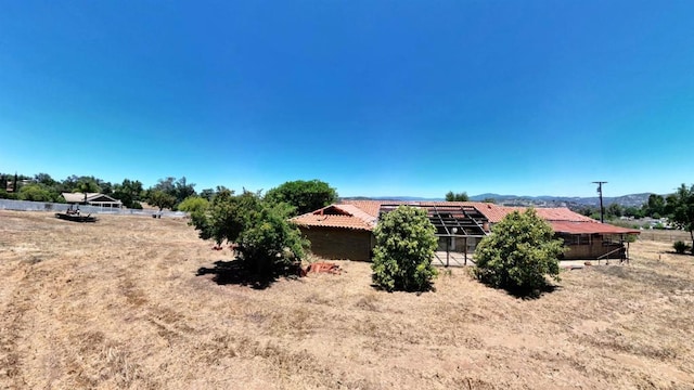 700 Ash St, Ramona, CA 92065 - view of side of property with a tiled roof and a mountain view