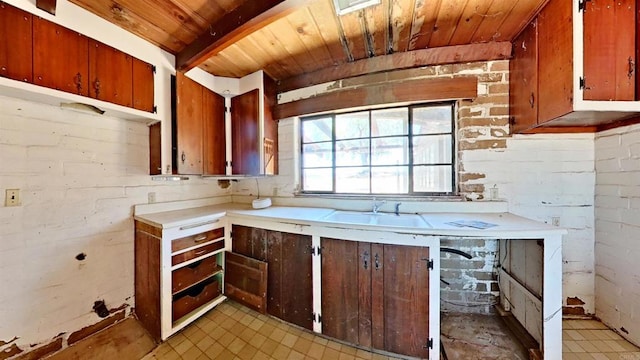 700 Ash St, Ramona, CA 92065 - kitchen with wooden ceiling, light countertops, and light flooring