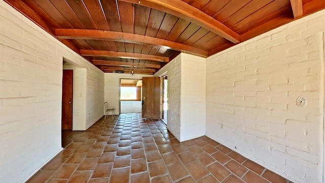 700 Ash St, Ramona, CA 92065 - hallway featuring a wooden ceiling with exposed beams and brick wall