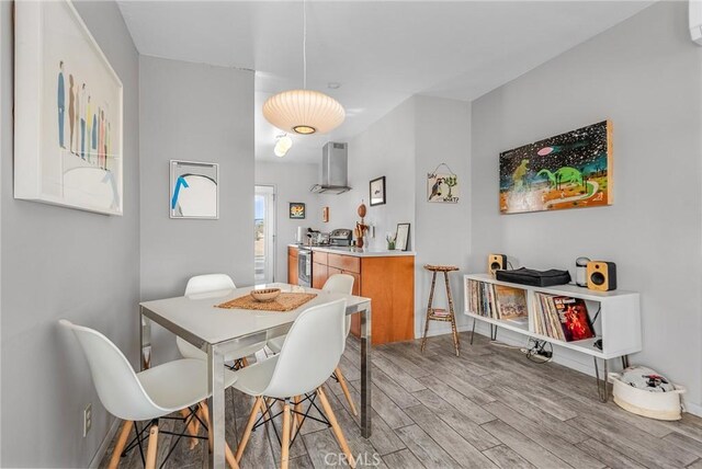 2654 Olympic Rd, Joshua Tree, CA 92252 - dining room featuring light wood-style flooring and baseboards