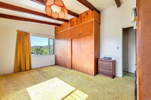 2151 Catalina Ave, Vista, CA 92084 - unfurnished bedroom featuring beam ceiling, carpet flooring, and a closet