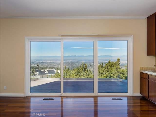 3311 Crownview Dr, Rancho Palos Verdes, CA 90275 - doorway with dark wood-style flooring, a mountain view, and ornamental molding