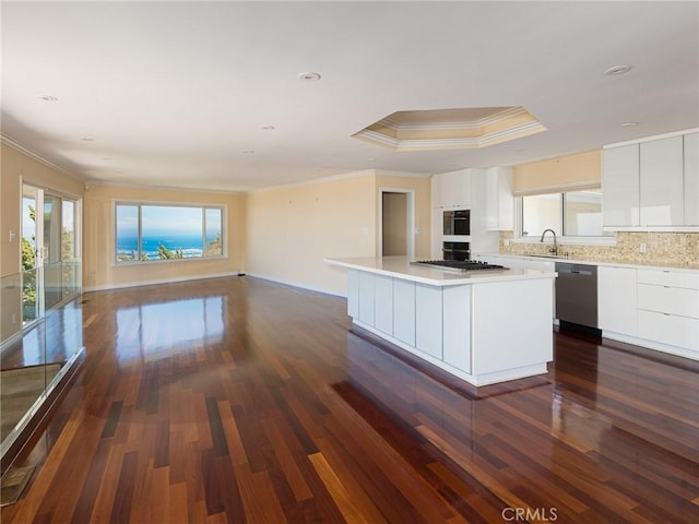 3311 Crownview Dr, Rancho Palos Verdes, CA 90275 - kitchen featuring dishwasher, crown molding, healthy amount of natural light, a kitchen island, and dark wood-style flooring