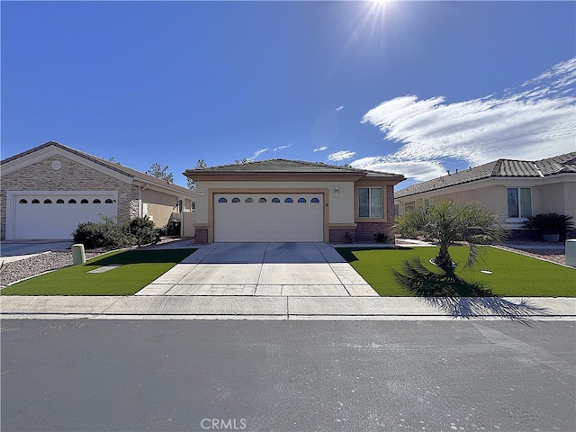 11115 Sun River Ct, Apple Valley, CA 92308 - single story home with an attached garage, driveway, a front yard, brick siding, and stucco siding