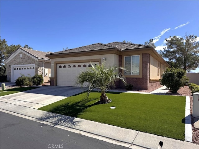 11115 Sun River Ct, Apple Valley, CA 92308 - single story home featuring an attached garage, driveway, a front lawn, stucco siding, and brick siding