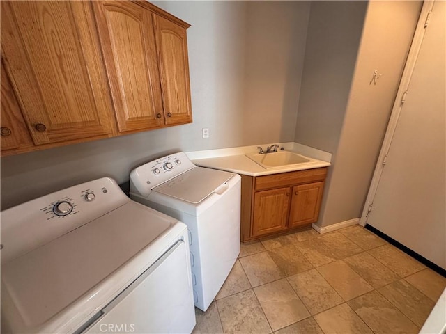 11115 Sun River Ct, Apple Valley, CA 92308 - laundry room with washing machine and clothes dryer and cabinet space