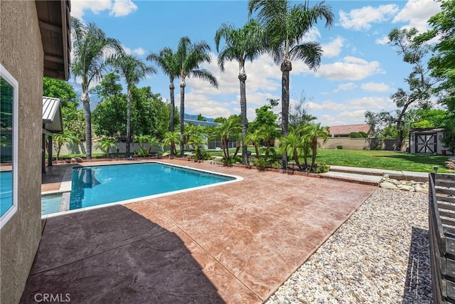 5829 Zapata Pl, Rancho Cucamonga, CA 91737 - swimming pool featuring a shed, a patio area, and a yard