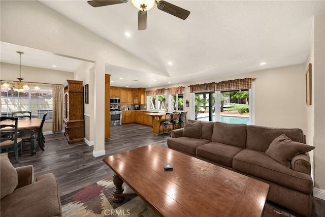 5829 Zapata Pl, Rancho Cucamonga, CA 91737 - living area featuring vaulted ceiling, dark wood-type flooring, a ceiling fan, recessed lighting, and a chandelier