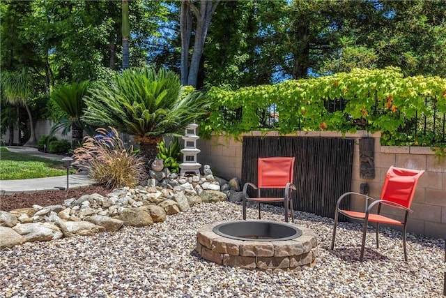 5829 Zapata Pl, Rancho Cucamonga, CA 91737 - view of patio with an outdoor fire pit