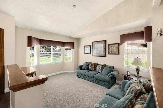 5829 Zapata Pl, Rancho Cucamonga, CA 91737 - carpeted living area featuring vaulted ceiling and baseboards