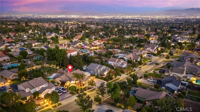 5829 Zapata Pl, Rancho Cucamonga, CA 91737 - aerial view at dusk of a residential view