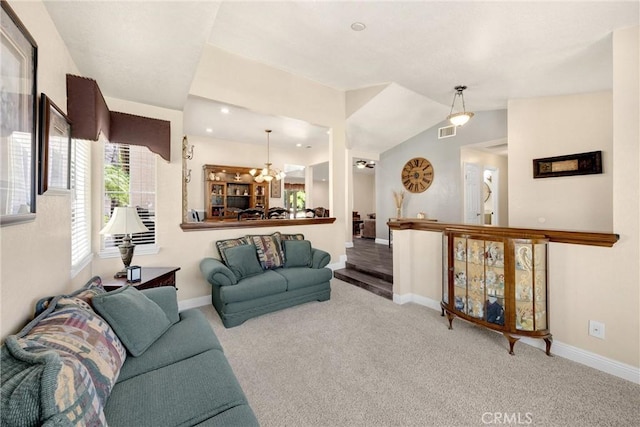 5829 Zapata Pl, Rancho Cucamonga, CA 91737 - carpeted living area featuring a chandelier and vaulted ceiling