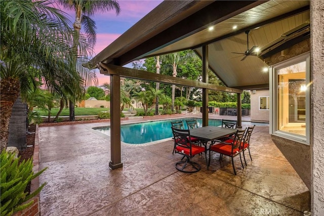 5829 Zapata Pl, Rancho Cucamonga, CA 91737 - outdoor pool with a ceiling fan, a patio area, a fenced backyard, and outdoor dining area