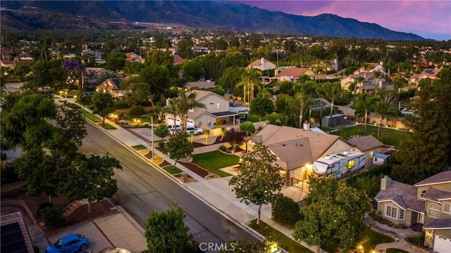 5829 Zapata Pl, Rancho Cucamonga, CA 91737 - aerial view at dusk of a mountain view and a residential view