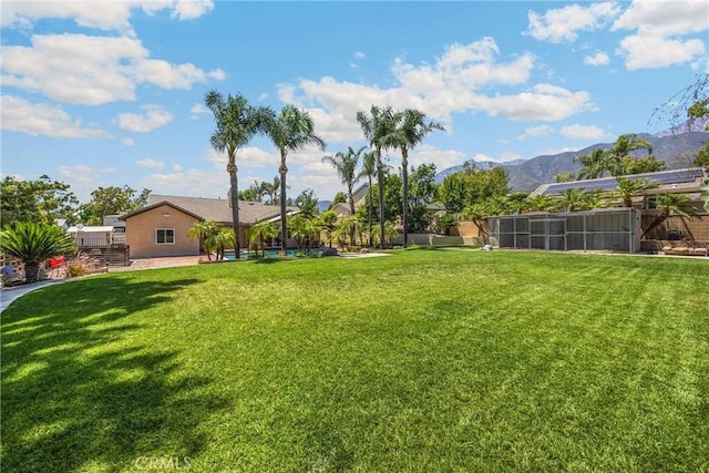5829 Zapata Pl, Rancho Cucamonga, CA 91737 - view of grassy yard featuring a mountain view