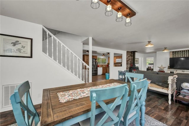20511 Santa Barbara Ave, Middletown, CA 95461 - dining area featuring stairway, wood finished floors, and ornate columns