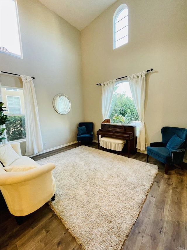 1546 Quiet Trail Dr, Chula Vista, CA 91915 - living area with a towering ceiling and wood finished floors