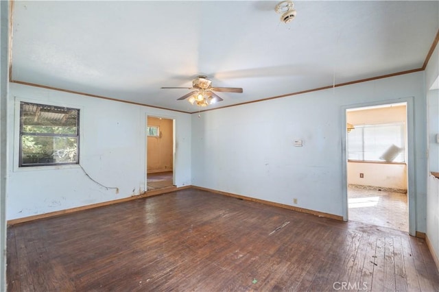 3142 Keith Ave, Castro Valley, CA 94546 - unfurnished room featuring crown molding, a ceiling fan, plenty of natural light, and wood-type flooring