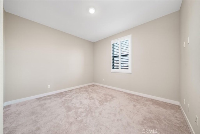 111 Spoke, Irvine, CA 92618 - spare room featuring carpet floors and baseboards