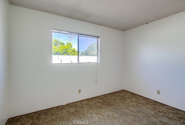 1361 Monterey Ct, Chula Vista, CA 91911 - empty room with carpet floors and a textured ceiling