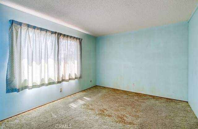 1361 Monterey Ct, Chula Vista, CA 91911 - spare room featuring carpet floors and a textured ceiling