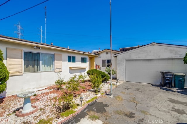 1361 Monterey Ct, Chula Vista, CA 91911 - ranch-style home featuring stucco siding, asphalt driveway, and an attached garage