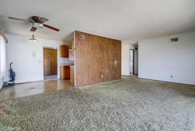 1361 Monterey Ct, Chula Vista, CA 91911 - unfurnished living room featuring a ceiling fan and a textured ceiling