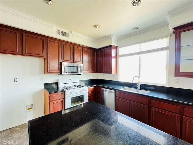 405 E Lurelane St, Rialto, CA 92376 - kitchen featuring stainless steel appliances, dark brown cabinets, ornamental molding, glass insert cabinets, and dark stone countertops