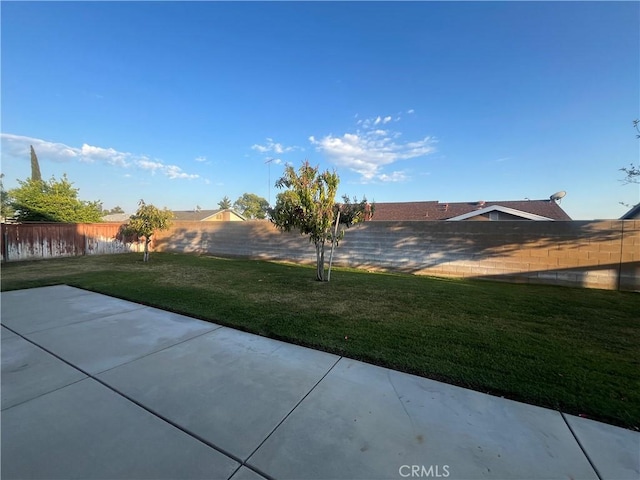 405 E Lurelane St, Rialto, CA 92376 - fenced backyard featuring a patio area