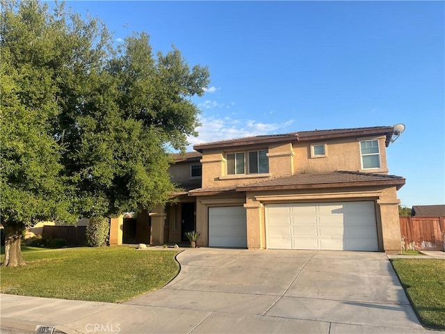405 E Lurelane St, Rialto, CA 92376 - view of front of home featuring a garage, stucco siding, concrete driveway, and a tiled roof