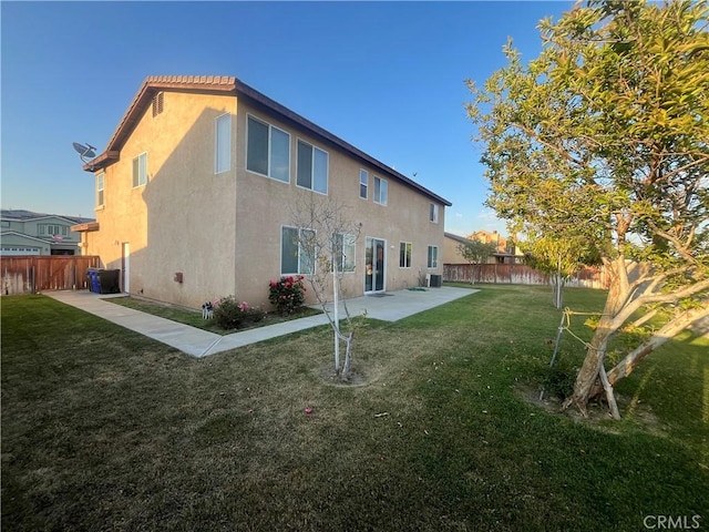 405 E Lurelane St, Rialto, CA 92376 - rear view of property featuring stucco siding and a patio area