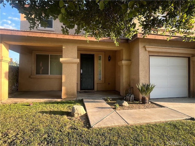 405 E Lurelane St, Rialto, CA 92376 - view of front of house with stucco siding and a garage