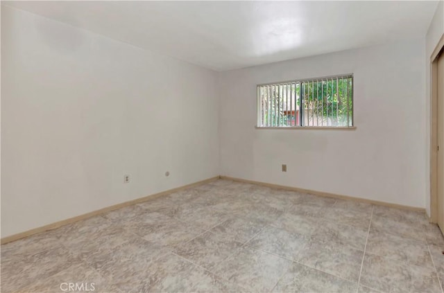 26441 Paseo Carmel Unit 8E, San Juan Capistrano, CA 92675 - spare room with baseboards