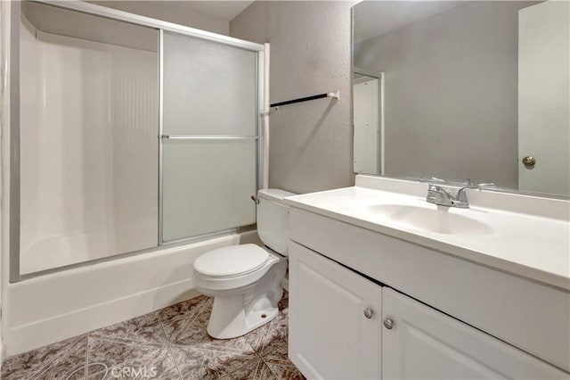 26441 Paseo Carmel Unit 8E, San Juan Capistrano, CA 92675 - bathroom with vanity, shower / bath combination with glass door, tile patterned floors, and a textured wall