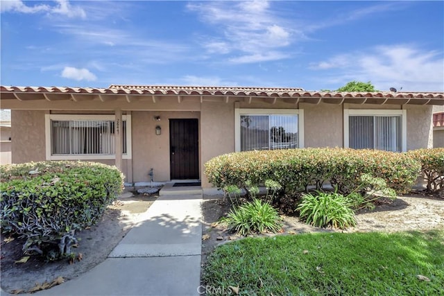 26441 Paseo Carmel Unit 8E, San Juan Capistrano, CA 92675 - view of front of house featuring stucco siding