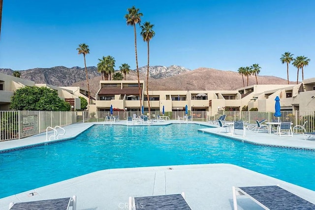 1655 E Palm Canyon Dr Unit 308, Palm Springs, CA 92264 - community pool featuring a mountain view, a patio, and a residential view