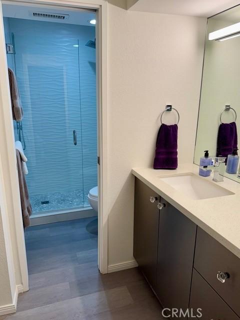 1655 E Palm Canyon Dr Unit 308, Palm Springs, CA 92264 - bathroom with vanity and a shower stall