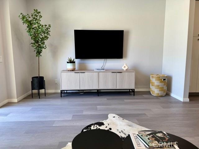 1655 E Palm Canyon Dr Unit 308, Palm Springs, CA 92264 - living area with wood finished floors