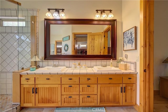 670 Highland Hills Rd, Nipomo, CA 93444 - full bathroom featuring double vanity and tasteful backsplash