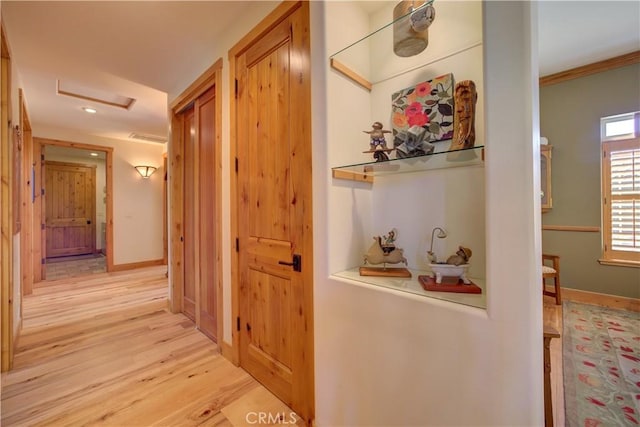 670 Highland Hills Rd, Nipomo, CA 93444 - hallway with light wood-type flooring, attic access, crown molding, and recessed lighting