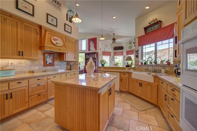 670 Highland Hills Rd, Nipomo, CA 93444 - kitchen with backsplash, electric cooktop, ceiling fan, a center island, and oven